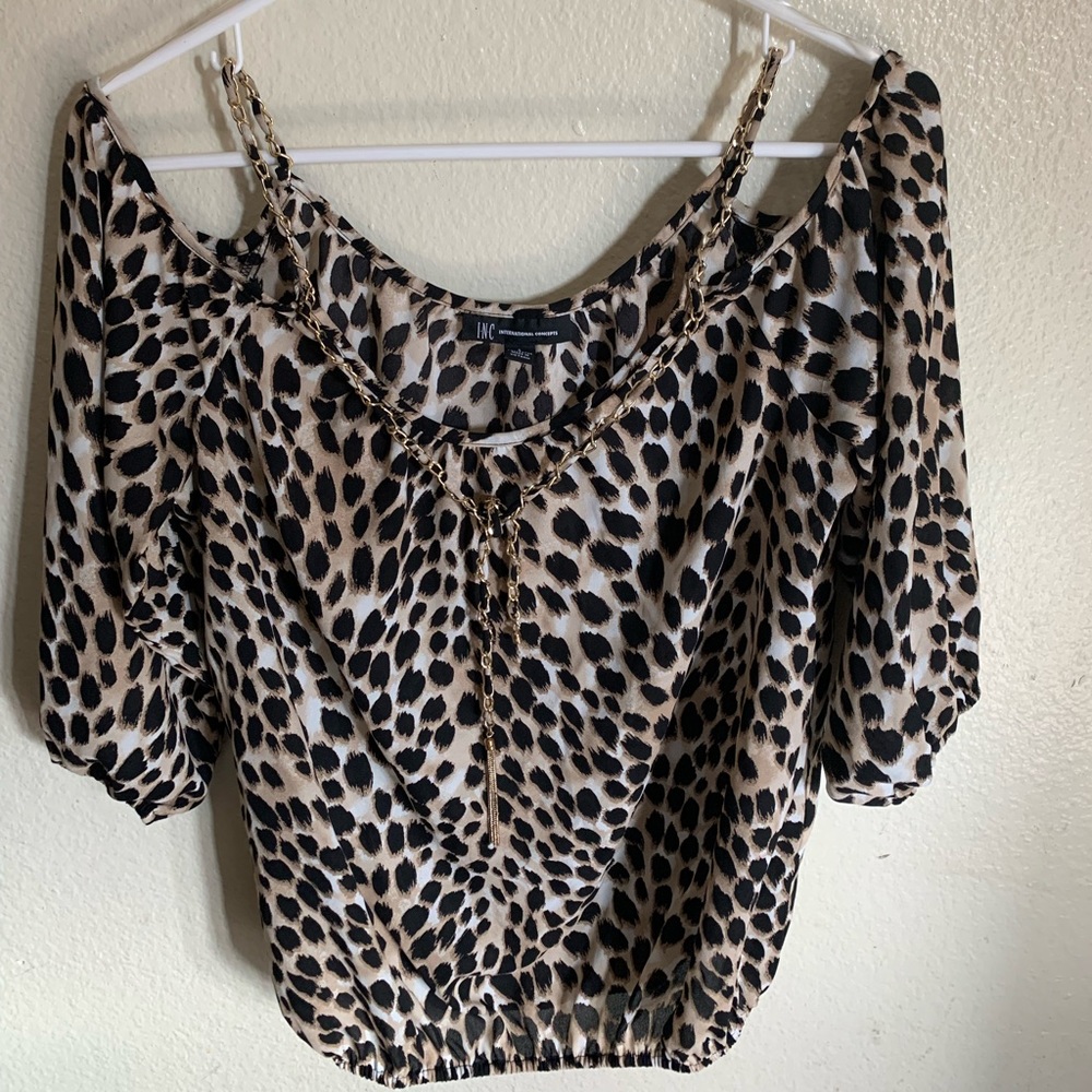 Cheetah print off the shoulder blouse